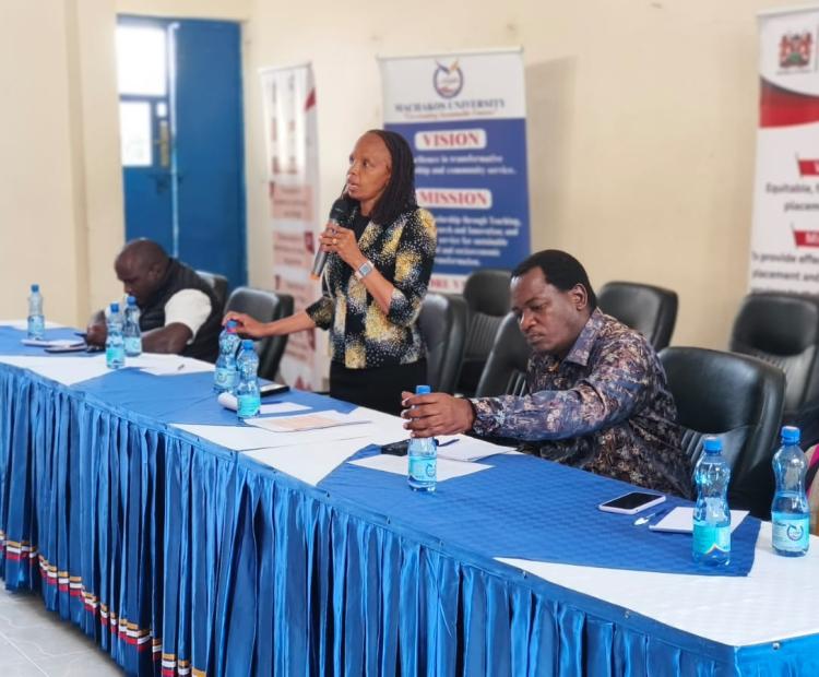 KUCCPS CEO and other staff at a panel discussion