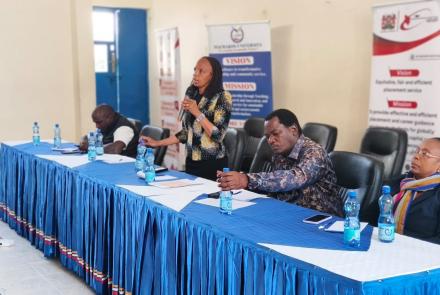KUCCPS CEO and other staff at a panel discussion